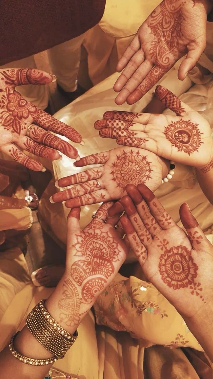 Hands decorated with mehendi